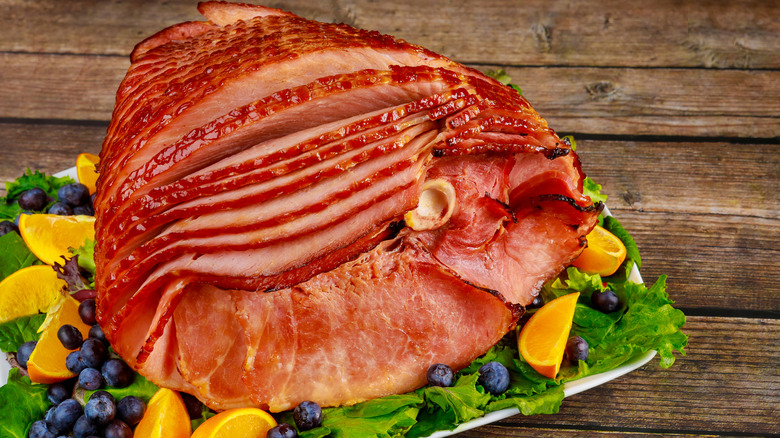 Spiral ham with blueberries and oranges