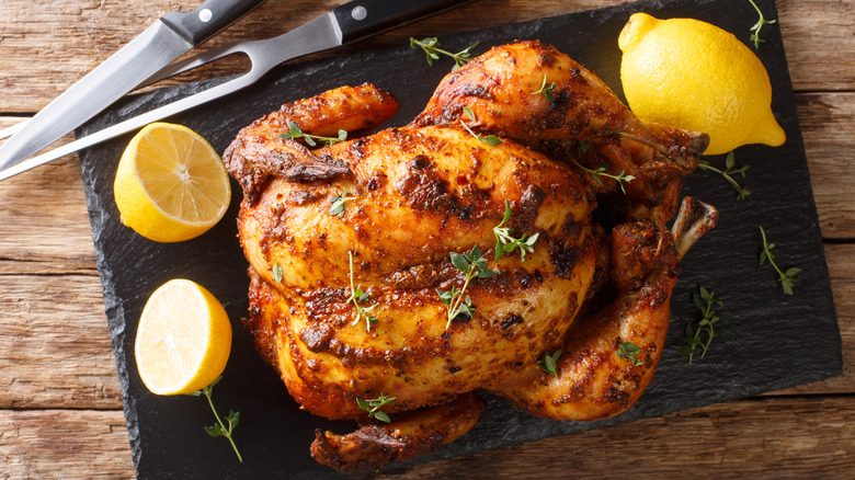 roasted chicken on cutting board