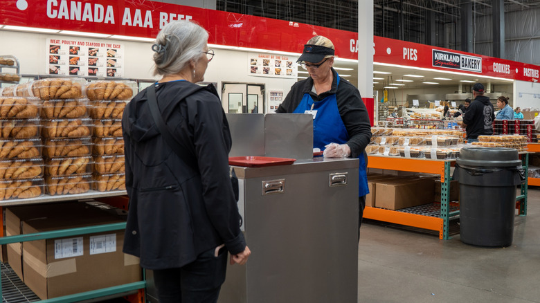 person waiting for Costco sample
