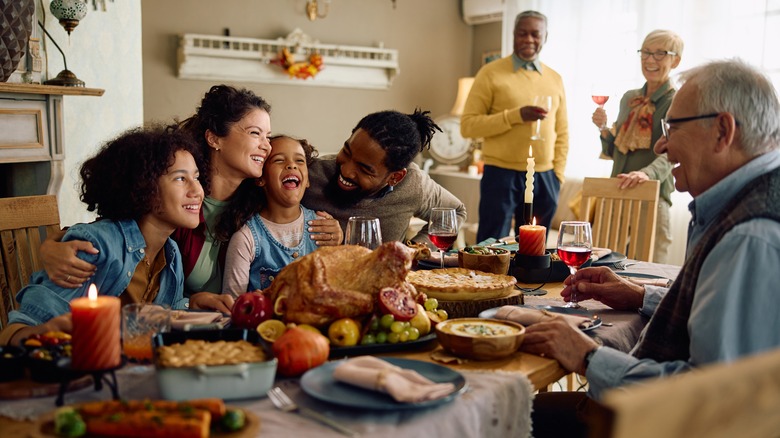 A family around the Thanksgiving dinner table