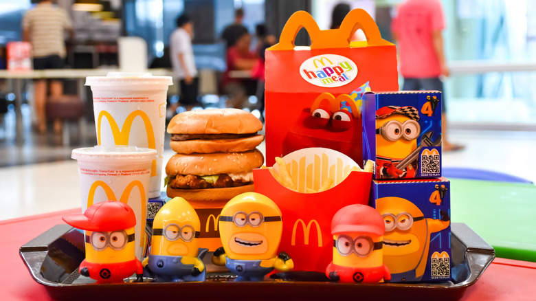 McDonald's Happy Meals and food on a tray with Minions toys