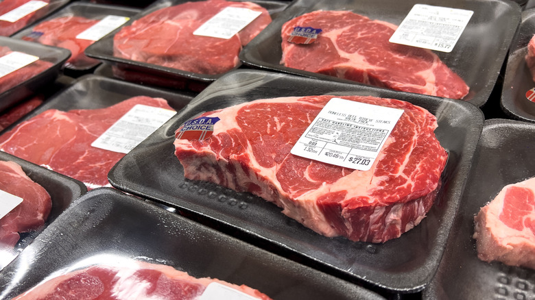 Steaks in packages at a grocery store