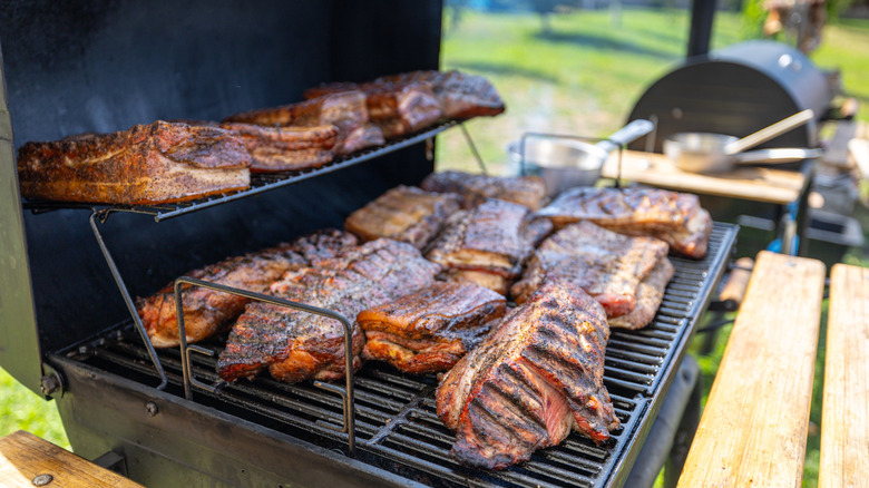 Meat smoking on BBQ smoker