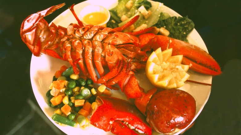 A vintage photo of a lobster dinner