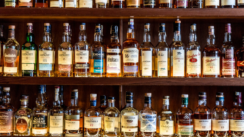 Various bottles of Scottish whiskey on display