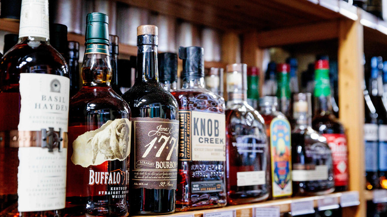 Various bourbon bottles on a store shelf