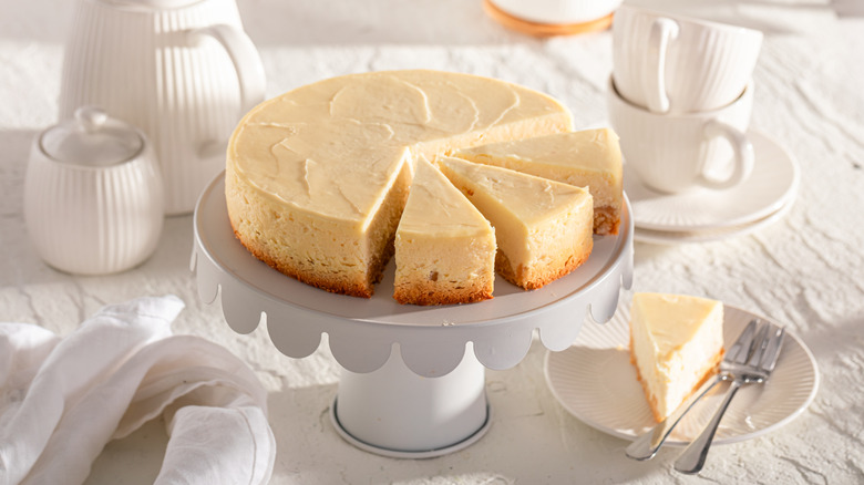 Plain cheesecake on a white table setting