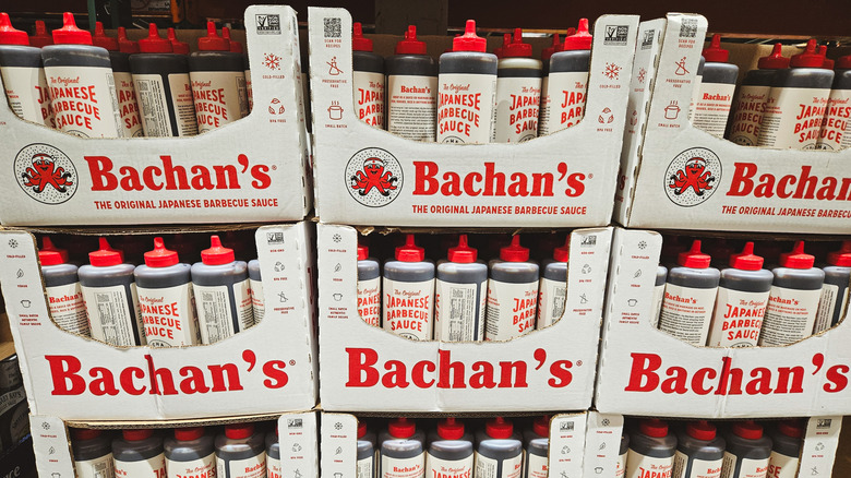 Cases of Bachan's Japanese Barbecue Sauce on a grocery store shelf.