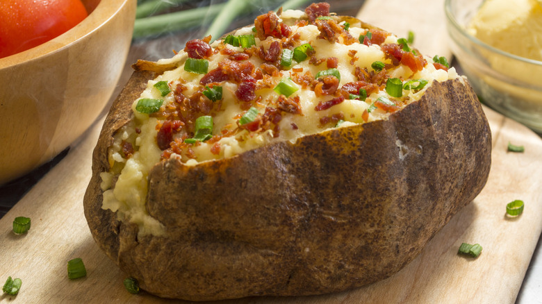 Baked potato with bacon and chives