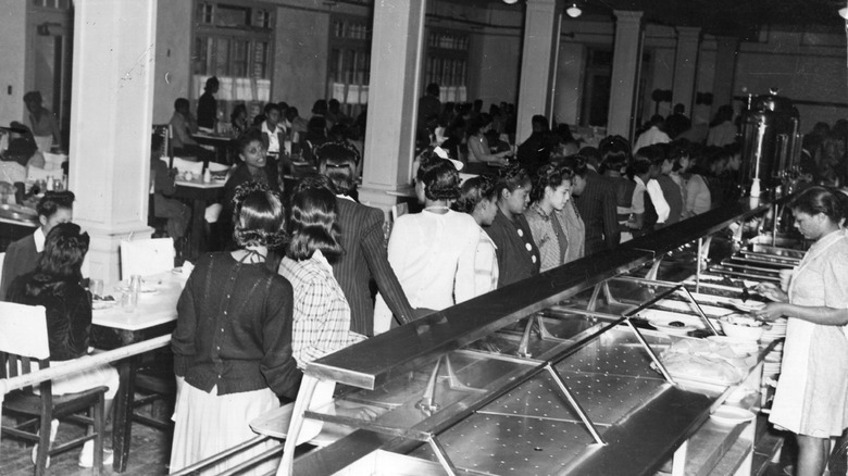 A high school cafeteria in the 1960s