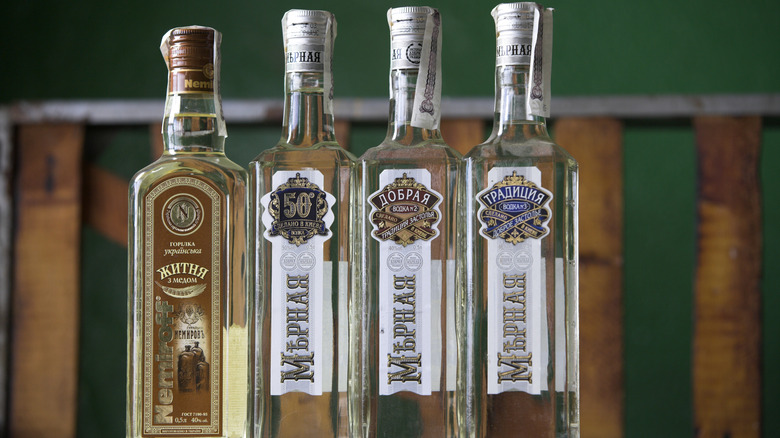 Bottles of Russian vodka sitting on a table