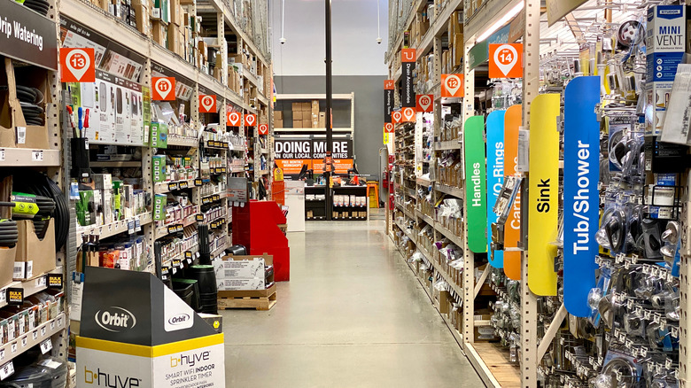Plumbing aisle of a Home Depot store