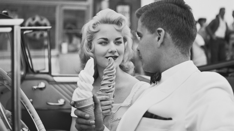 1950s couple eating Carvel soft-serve cones