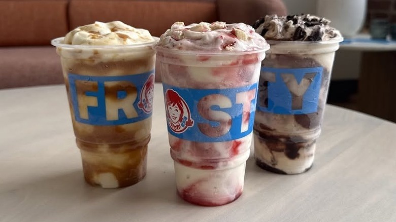 Three Wendy's Frosty Fusions on a table