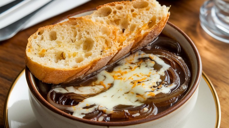 French onion soup with sliced baguette