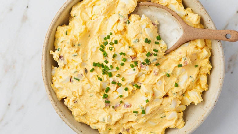 closeup of egg salad with bacon