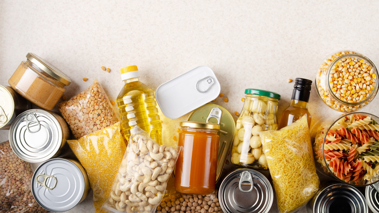 Assorted grocery dry goods arranged on a light colored background