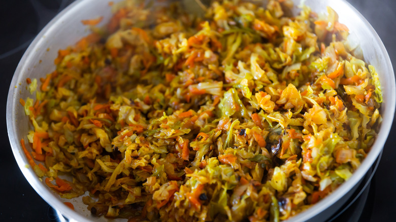 braised white cabbage in a stainless steel pan