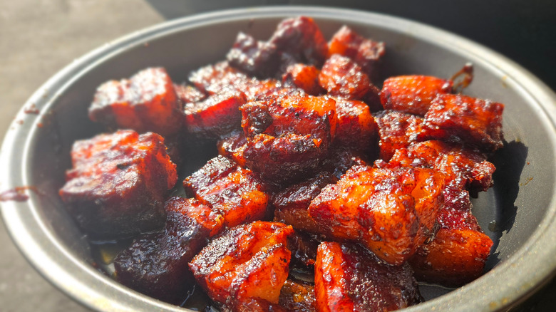 Pork belly burnt ends in a bowl, looking juicy and succulent