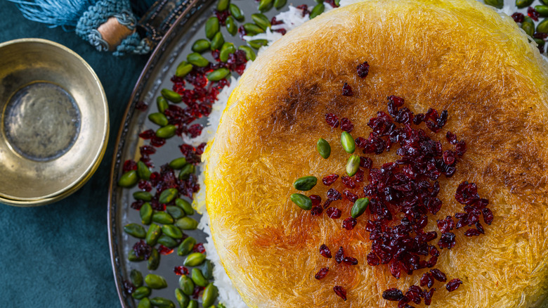 Persian rice with golden tahdig topped with barberries