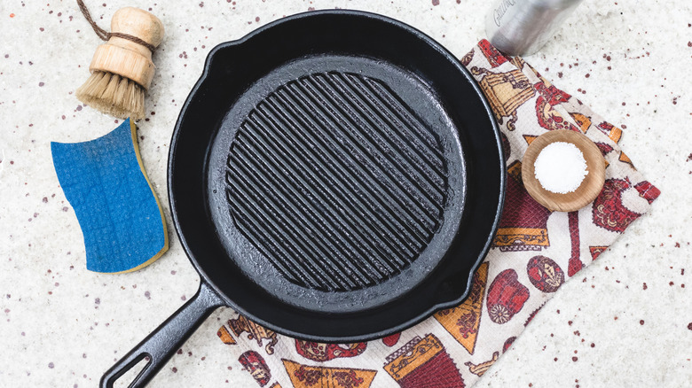 Cast iron pan with all the cleaning supplies