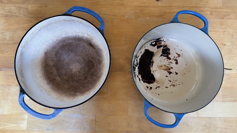 Two dirty dutch ovens