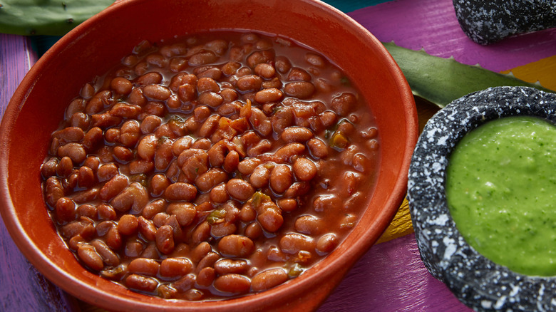 mexican beans with rice and sauces nopal and pico de gallo