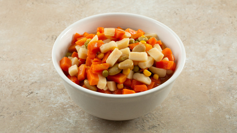 a bowl of canned mixed vegetables