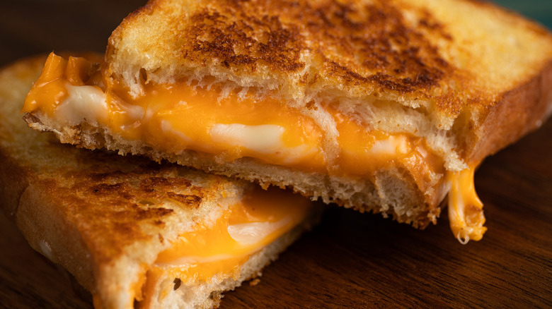 Gooey grilled cheese sandwich on a plate at a restaurant