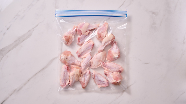 chicken wings in a plastic bag