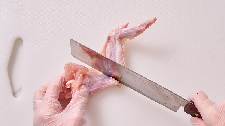 slicing between the flat and drum with a knife