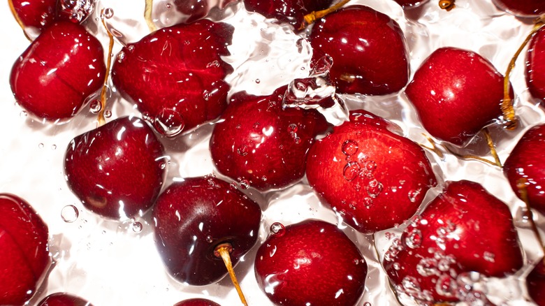 Cherries submerged in water