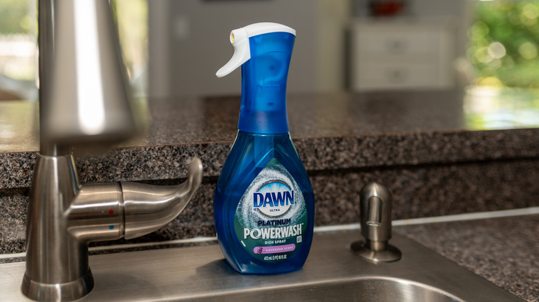 Dawn Powerwash dish soap sitting on the edge of a sink