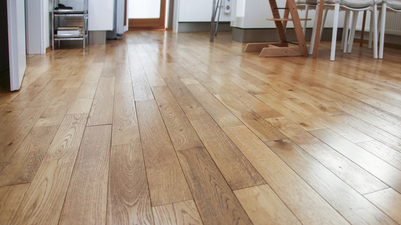 Spotless hardwood floors that reflect the lighting