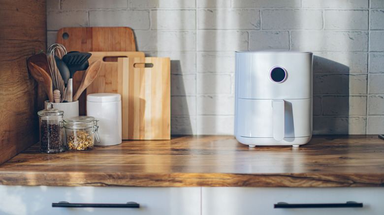Air fryer on a spacious kitchen counter.