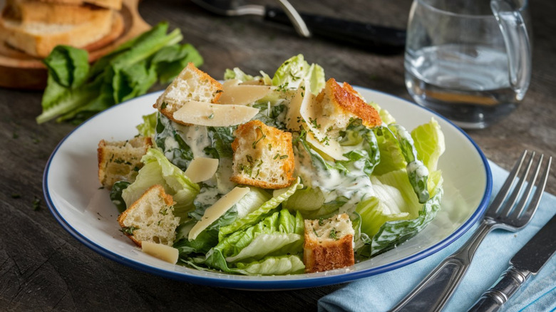 Caesar salad in white bowl