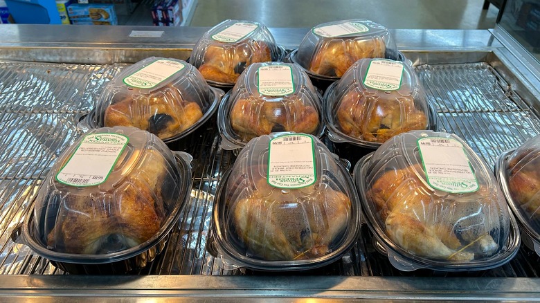 Rotisserie chickens on display at the grocery store