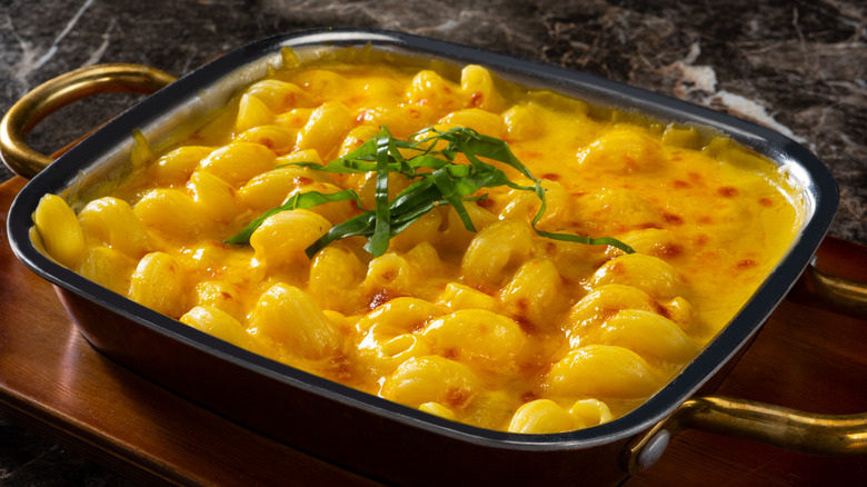 A close up of a baking dish filled with macaroni and cheese