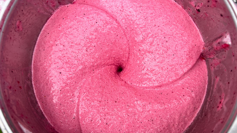 Pink smoothie swirl in blender