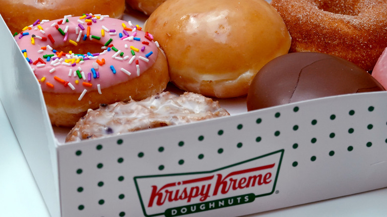 Close up of Krispy Kreme doughnuts in the branded box