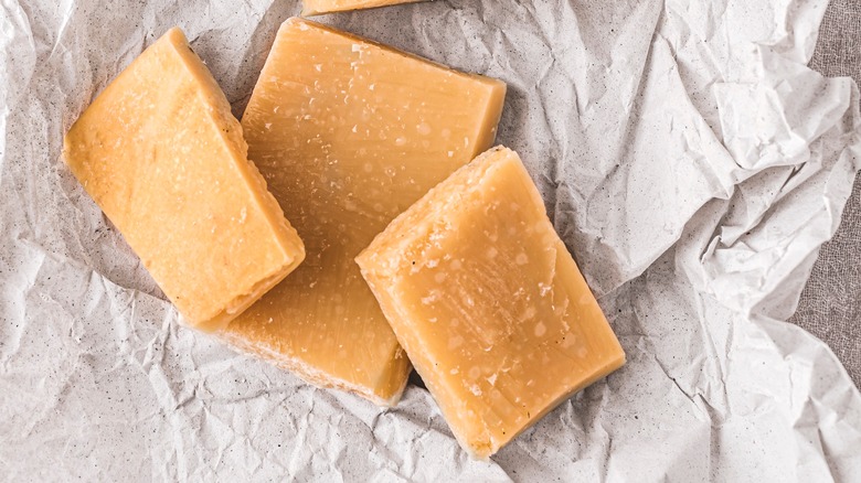 Parmesan rinds on white paper