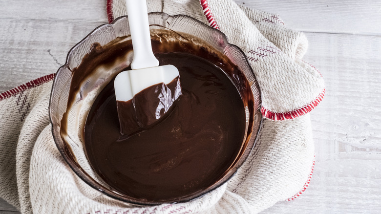 A glass bowl of brownie mix.