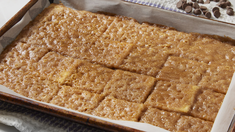 saltine toffee squares on a baking sheet