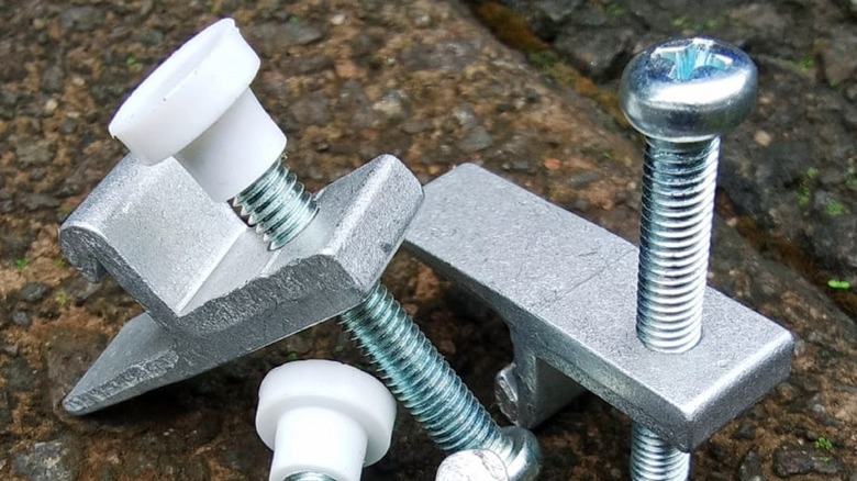 sink mounting clips sitting on counter