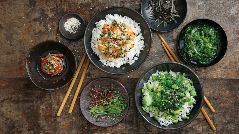 Variety of rice bowls and side dishes