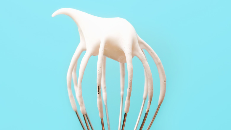 Whisk with whipped cream