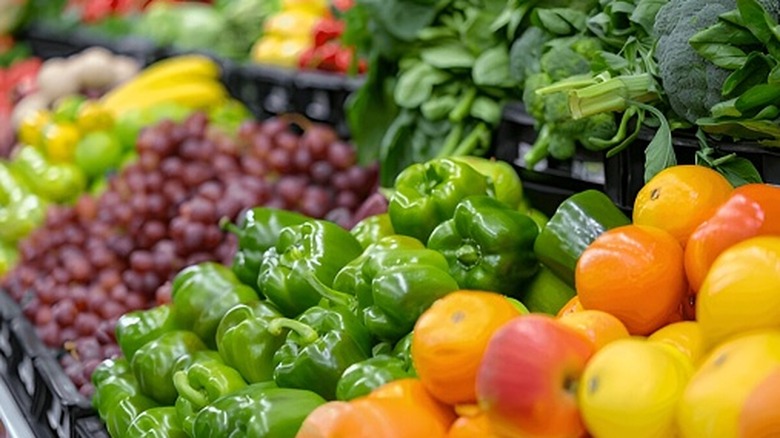 An array of various produce at a grocery store, all neatly arranged.