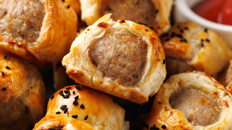 up close shot of puff pastry sausage rolls