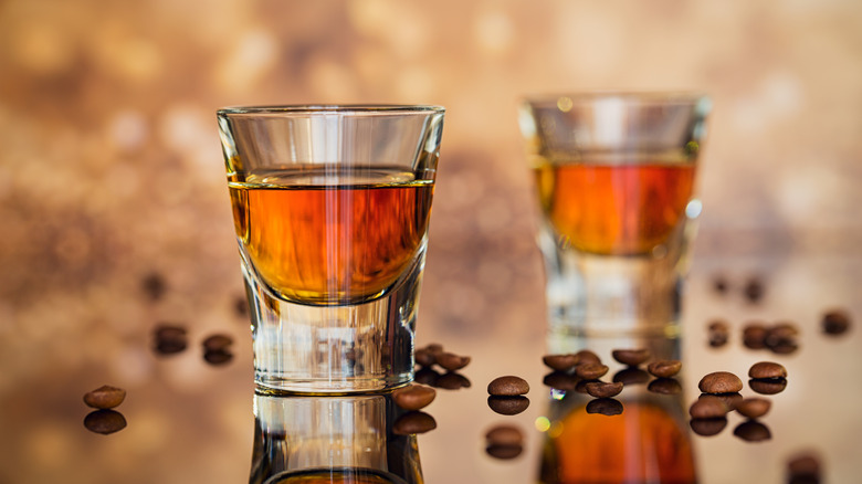 shot of bourbon with coffee beans