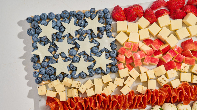 Close up of the blueberries and cheese stars on the snack board